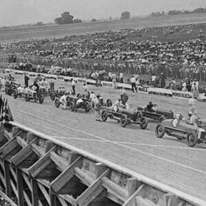 Auto racers at Speedway line up at starting line to begin the race. - Art Print