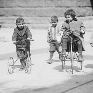 Children with Tricycles Playing in Manhattan Street - Art Print