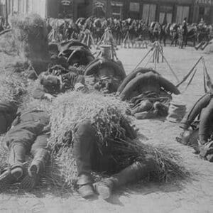 French soldiers in full pack bed down on straw after a long march - Art Print